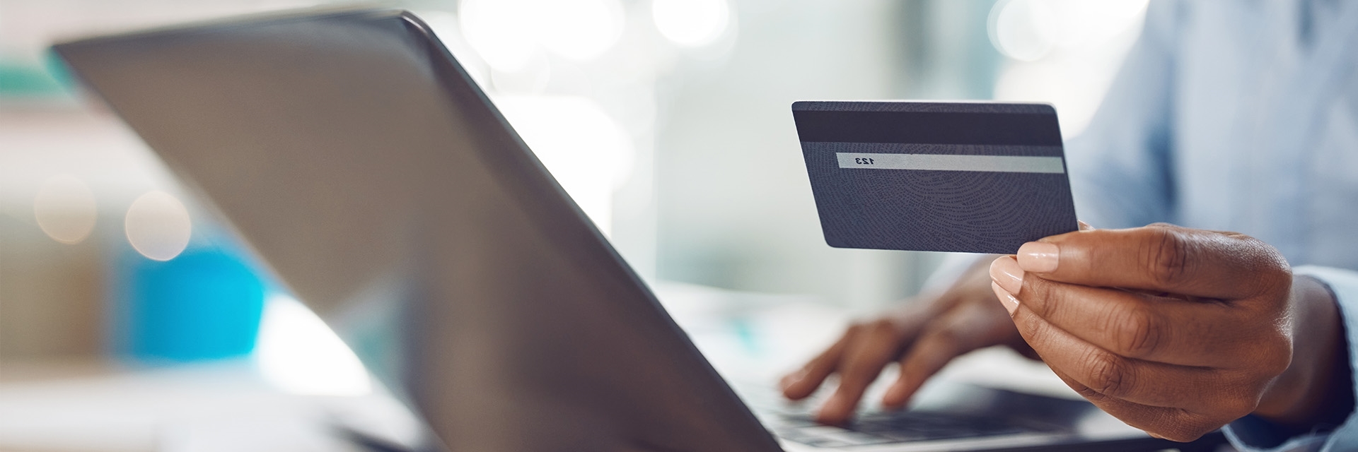 A woman holding a card